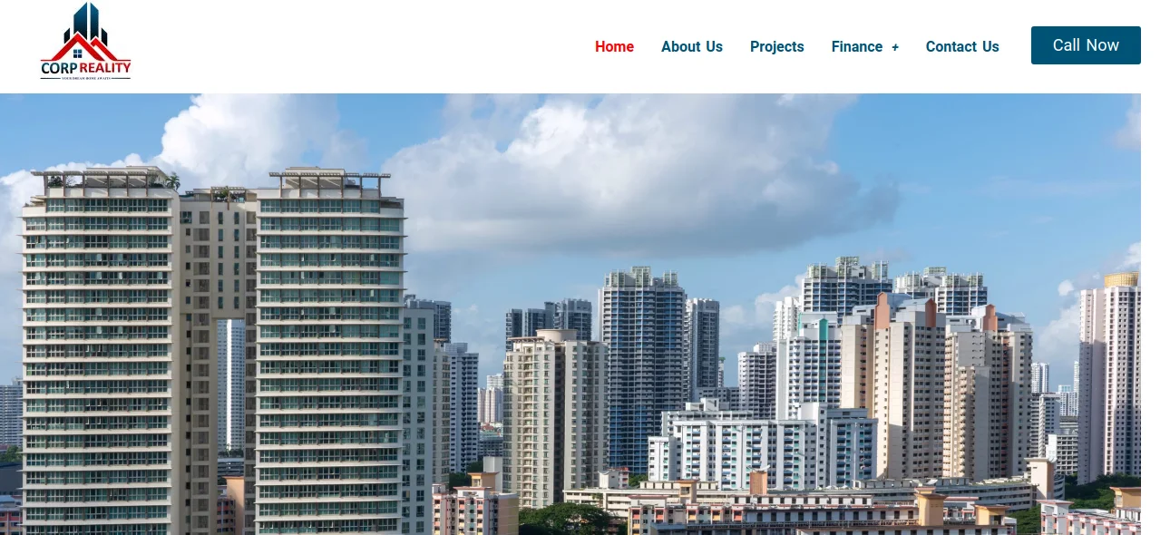 Corp Realty's homepage displays a skyline view of modern residential high-rise buildings. These urban real estate projects stand tall against a clear blue sky.